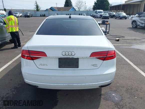 2015 Audi A8 4.0T with VIN WAU32AFD6FN039739, listed as a IAAI auction lot 41946401 with 102,668 mi miles and . Bid and sale history available at DreamBid. Image 16.