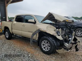 2017 Toyota Tacoma SR5 with VIN 5TFAZ5CN2HX030781, listed as a Copart auction lot 53957535 with 105,606 mi miles and Salvage Title. Bid and sale history available at DreamBid. Image 4.