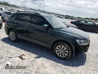2018 Volkswagen Tiguan S with VIN 3VV0B7AX4JM042248, listed as a Copart auction lot 65202625 with 102,021 mi miles and Salvage title. Bid and sale history available at DreamBid. Image 4.
