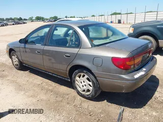 2001 Saturn SL with VIN 1G8ZK52751Z316039, listed as a IAAI auction lot 42035329 with 236,658 mi miles and . Bid and sale history available at DreamBid. Image 3.