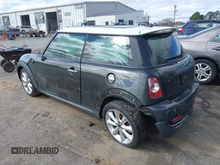 2013 MINI Hardtop S with VIN WMWSV3C50DT394345, listed as a IAAI auction lot 41738216 with 58,241 mi miles and . Bid and sale history available at DreamBid. Image 3.