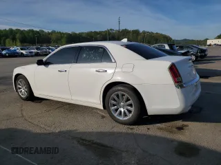 2012 Chrysler 300 Limited with VIN 2C3CCACGXCH216512, listed as a Copart auction lot 54104655 with 228,538 mi miles and Clean Title. Bid and sale history available at DreamBid. Image 2.