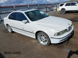 1997 BMW 5 Series 540i z VIN WBADE6327VBW53212, wystawiony jako IAAI lot #42310586 z przebiegiem Nie podano mil oraz . Historia ofert i sprzedaży dostępna na DreamBid. Obrazek 1.