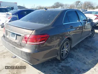 2014 Mercedes-Benz E 550 Sport with VIN WDDHF9BB5EA971894, listed as a IAAI auction lot 41405571 with 113,363 mi miles and . Bid and sale history available at DreamBid. Image 4.