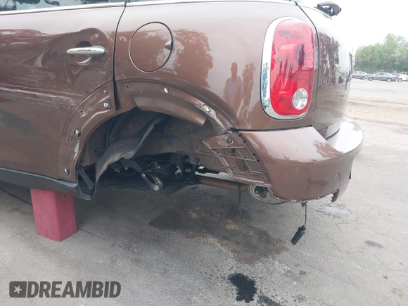 2013 MINI Countryman with VIN WMWZB3C56DWM09484, listed as a IAAI auction lot 42039954 with 37,264 mi miles and . Bid and sale history available at DreamBid. Image 6.