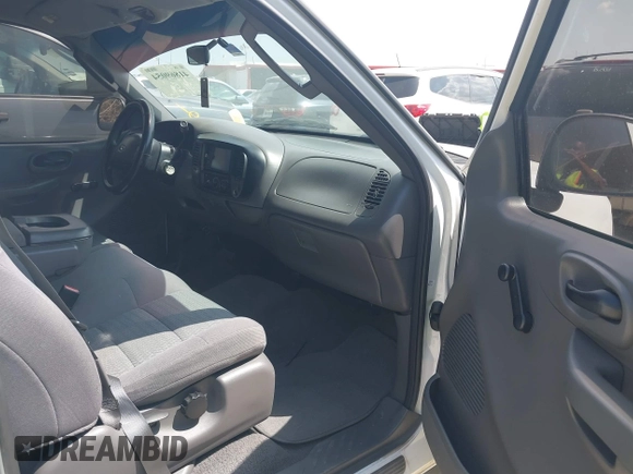 2004 Ford F-150 XL with VIN 2FTRX17264CA69306, listed as a IAAI auction lot 41869054 with 247,183 mi miles and . Bid and sale history available at DreamBid. Image 5.