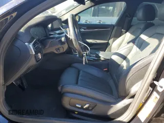 2020 BMW 5 Series 530e with VIN WBAJA9C00LCD60874, listed as a Copart auction lot 87960825 with 91,036 mi miles and Salvage Title. Bid and sale history available at DreamBid. Image 7.