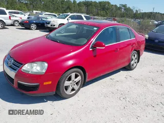2009 Volkswagen Jetta SE z VIN 3VWRZ71K19M042108, wystawiony jako IAAI lot #41876859 z przebiegiem 187 206 mil mil oraz . Historia ofert i sprzedaży dostępna na DreamBid. Obrazek 2.
