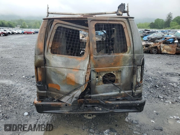 2013 Ford Econoline Cargo Commercial z VIN 1FTNE2EL6DDB16274, wystawiony jako Copart lot #56663535 z przebiegiem Nie podano mil oraz Szkody całkowita. Historia ofert i sprzedaży dostępna na DreamBid. Obrazek 6.