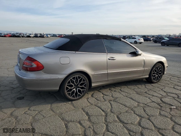 2005 Mercedes-Benz CLK-Class 3.2L with VIN WDBTK65J95F141809, listed as a Copart auction lot 48561525 with 212,346 mi miles and Salvage Title. Bid and sale history available at carsss.com. Image 3.