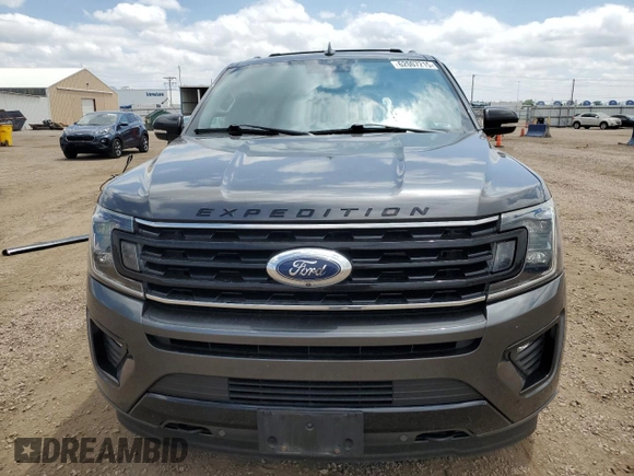 2021 Ford Expedition Limited z VIN 1FMJU2AT1MEA16614, wystawiony jako Copart lot #62007215 z przebiegiem 32 995 mil mil oraz Szkoda całkowita • Salvage title. Historia ofert i sprzedaży dostępna na DreamBid. Obrazek 5.