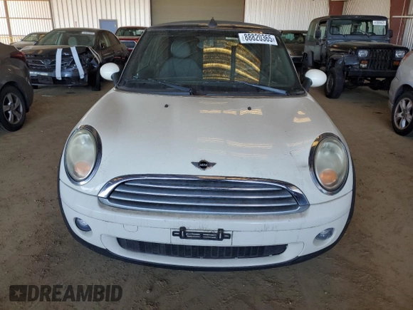 2010 MINI Convertible with VIN WMWMR3C59ATU98390, listed as a Copart auction lot 88820365 with 93,029 mi miles and Clean Title. Bid and sale history available at DreamBid. Image 5.