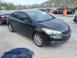 2014 Kia Forte EX with VIN KNAFX4A86E5049938, listed as a IAAI auction lot 42038755 with 82,016 mi miles. Bid and sale history available at carsss.com. Image 1.