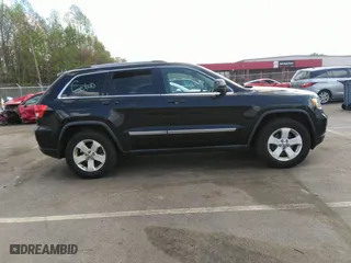 2011 Jeep Grand Cherokee Laredo with VIN 1J4RR4GTXBC538060, listed as a IAAI auction lot 41964694 with 152,999 mi miles. Bid and sale history available at carsss.com. Image 14.
