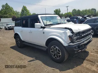2024 Ford Bronco Outer Banks with VIN 1FMEE8BP0RLA31725, listed as a Copart auction lot 60918675 with 10,452 mi miles and Salvage title. Bid and sale history available at DreamBid. Image 4.
