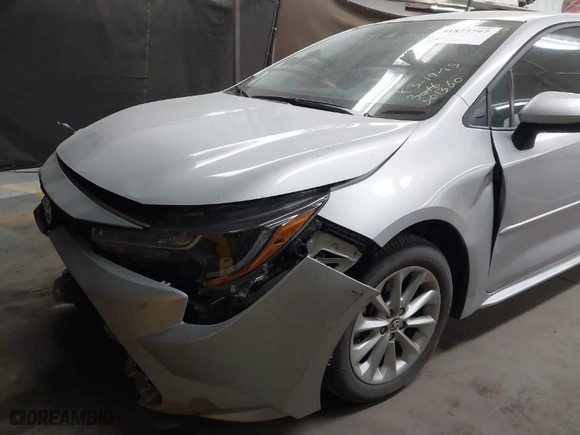 2022 Toyota Corolla LE with VIN 5YFVPMAEXNP301360, listed as a IAAI auction lot 41877797 with 12,404 mi miles. Bid and sale history available at carsss.com. Image 6.