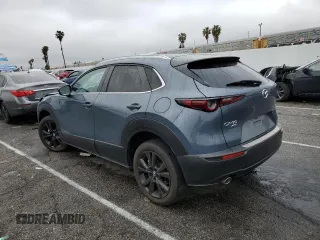 2023 Mazda CX-30 2.5 S Carbon Edition with VIN 3MVDMBCMXPM542809, listed as a Copart auction lot 51134315 with 21,279 mi miles and Salvage Title. Bid and sale history available at carsss.com. Image 2.