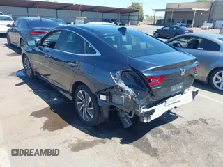 2022 Honda Insight Touring with VIN 19XZE4F90NE001251, listed as a IAAI auction lot 42303914 with 161,489 mi miles and . Bid and sale history available at DreamBid. Image 3.