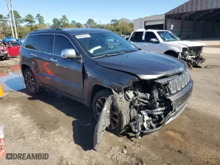2017 Jeep Grand Cherokee Overland with VIN 1C4RJECGXHC696676, listed as a Copart auction lot 86885924 with 154,754 mi miles and Salvage Title. Bid and sale history available at carsss.com. Image 4.