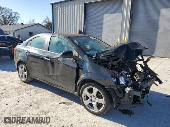 2013 Chevrolet Sonic LTZ z VIN 1G1JE5SH5D4121345, wystawiony jako Copart lot #83672124 z przebiegiem 109 428 mil mil oraz Szkoda całkowita • Salvage title. Historia ofert i sprzedaży dostępna na DreamBid. Obrazek 4.