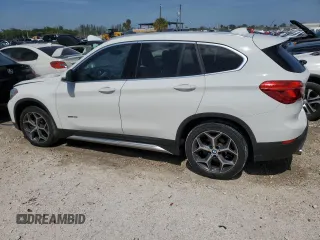 2018 BMW X1 sDrive28i with VIN WBXHU7C38J5H44459, listed as a Copart auction lot 49107553 with 96,494 mi miles. Bid and sale history available at carsss.com. Image 2.