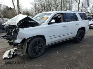 2015 GMC Yukon Denali with VIN 1GKS2CKJ3FR728320, listed as a Copart auction lot 46439535 with 0 mi miles and Salvage Title. Bid and sale history available at carsss.com. Image 1.