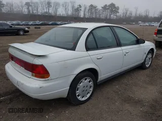 1997 Saturn SL z VIN 1G8ZK5272VZ270692, wystawiony jako IAAI lot #41926086 z przebiegiem 109 329 mil mil oraz . Historia ofert i sprzedaży dostępna na DreamBid. Obrazek 4.