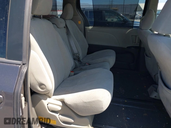 2011 Toyota Sienna LE AAS with VIN 5TDKK3DC4BS056872, listed as a IAAI auction lot 42643417 with 170,266 mi miles and . Bid and sale history available at DreamBid. Image 8.