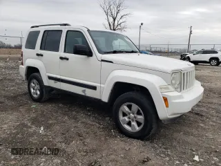 2010 Jeep Liberty Sport with VIN 1J4PP2GK9AW133958, listed as a Copart auction lot 47265675 with 124,466 mi miles and Salvage Title. Bid and sale history available at DreamBid. Image 4.
