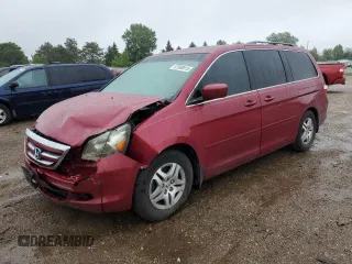 2006 Honda Odyssey EX-L z VIN 5FNRL38756B416802, wystawiony jako Copart lot #57588515 z przebiegiem 169 093 mil mil oraz Szkoda całkowita • Salvage title. Historia ofert i sprzedaży dostępna na DreamBid. Obrazek 1.