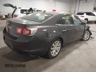 2013 Chevrolet Malibu LTZ with VIN 1G11H5SA1DF281933, listed as a IAAI auction lot 42114395 with 193,550 mi miles and . Bid and sale history available at DreamBid. Image 4.