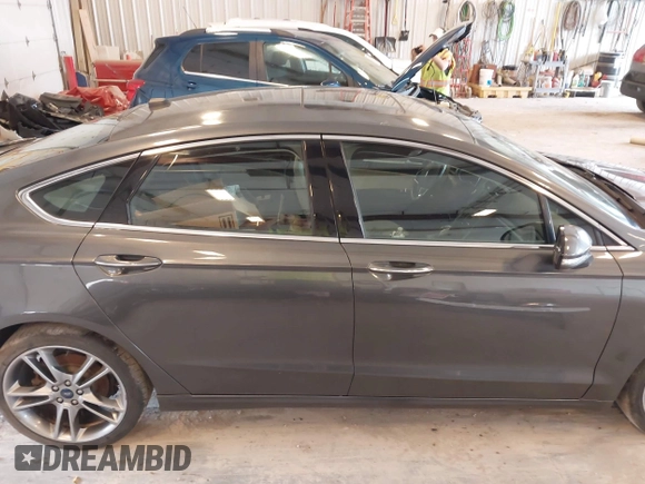 2016 Ford Fusion Titanium with VIN 3FA6P0D9XGR223354, listed as a IAAI auction lot 42621924 with Not provided miles and . Bid and sale history available at DreamBid. Image 13.