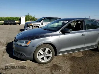 2014 Volkswagen Jetta TDI w/Premium z VIN 3VWLL7AJ8EM385667, wystawiony jako Copart lot #57804065 z przebiegiem 122 020 mil mil oraz Szkoda całkowita • Salvage title. Historia ofert i sprzedaży dostępna na DreamBid. Obrazek 13.