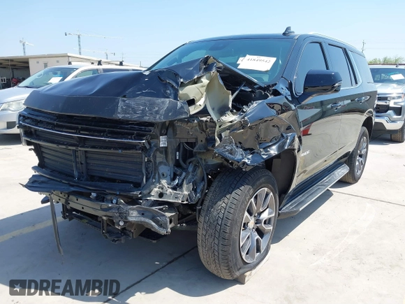 2024 Chevrolet Tahoe LT with VIN 1GNSCNKD7RR374098, listed as a IAAI auction lot 41849542 with 7,227 mi miles and . Bid and sale history available at DreamBid. Image 2.
