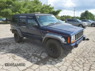 1997 Jeep Cherokee with VIN 1J4FN78S6VL604971, listed as a Copart auction lot 70690304 with 226,913 mi miles and Salvage title. Bid and sale history available at DreamBid. Image 4.
