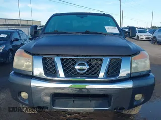 2010 Nissan Titan with VIN 1N6BA0FC1AN320629, listed as a IAAI auction lot 42491569 with 169,819 mi miles and . Bid and sale history available at DreamBid. Image 12.
