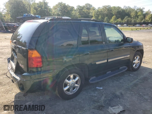 2003 GMC Envoy SLT with VIN 1GKDT13S032396374, listed as a Copart auction lot 74675134 with 115,280 mi miles and Salvage Title. Bid and sale history available at DreamBid. Image 3.