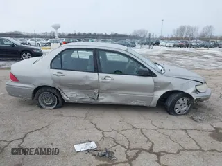 2002 Mitsubishi Lancer ES with VIN JA3AJ26E62U043039, listed as a IAAI auction lot 41600217 with 141,217 mi miles. Bid and sale history available at carsss.com. Image 13.