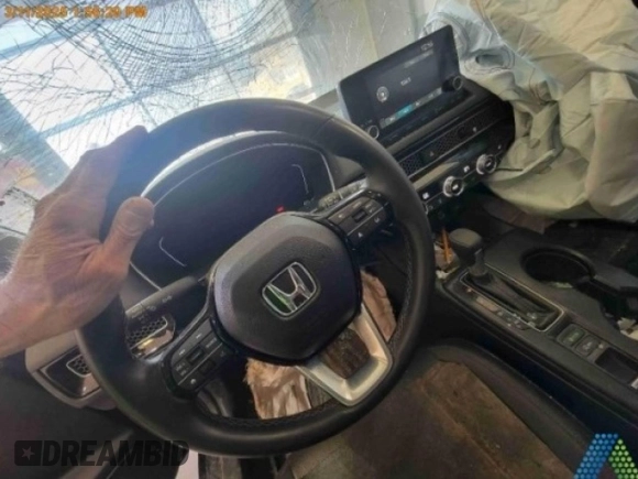 2024 Honda Civic EX-L z VIN 19XFL1H79RE015965, wystawiony jako Copart lot #49991195 z przebiegiem Nie podano mil oraz Szkoda całkowita • Salvage title. Historia ofert i sprzedaży dostępna na DreamBid. Obrazek 2.