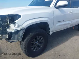2023 Toyota Tacoma SR with VIN 3TYCZ5AN2PT112854, listed as a IAAI auction lot 42220025 with 43,657 mi miles and . Bid and sale history available at DreamBid. Image 20.