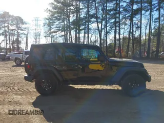 2022 Jeep Wrangler Unlimited Sport with VIN 1C4HJXDN6NW132859, listed as a IAAI auction lot 41362657 with 40,066 mi miles and . Bid and sale history available at DreamBid. Image 13.