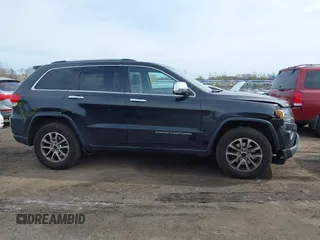 2014 Jeep Grand Cherokee Limited with VIN 1C4RJFBG4EC220054, listed as a IAAI auction lot 42050036 with 100,552 mi miles and . Bid and sale history available at DreamBid. Image 13.