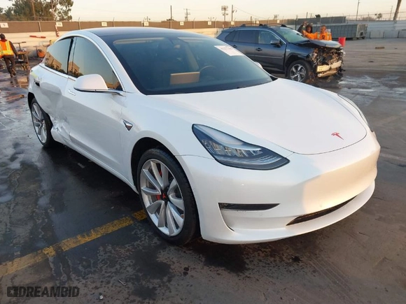 2018 Tesla Model 3 Long Range Battery with VIN 5YJ3E1EA1JF164821, listed as a IAAI auction lot 41277446 with 31,602 mi miles. Bid and sale history available at carsss.com. Image 1.