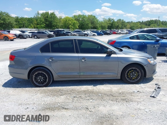 2014 Volkswagen Jetta S z VIN 3VW2K7AJ6EM253571, wystawiony jako IAAI lot #42186222 z przebiegiem 171 518 mil mil oraz . Historia ofert i sprzedaży dostępna na DreamBid. Obrazek 13.