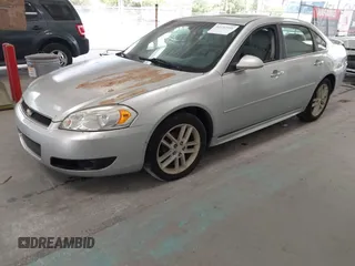 2015 Chevrolet Impala LTZ with VIN 2G1WC5E39F1115364, listed as a IAAI auction lot 42152951 with 122,335 mi miles and . Bid and sale history available at DreamBid. Image 2.