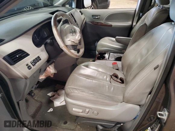 2014 Toyota Sienna XLE with VIN 5TDYK3DC0ES501557, listed as a Copart auction lot 56290015 with Not Provided miles and Clean Title. Bid and sale history available at DreamBid. Image 7.