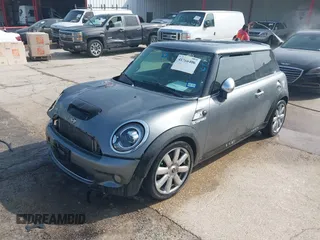 2009 MINI Hardtop S with VIN WMWMF73509TW86792, listed as a IAAI auction lot 41766406 with 174,724 mi miles and . Bid and sale history available at DreamBid. Image 2.