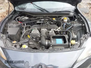 2015 Scion FR-S with VIN JF1ZNAA12F9713465, listed as a IAAI auction lot 41199978 with 96,993 mi miles. Bid and sale history available at carsss.com. Image 10.
