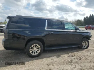 2015 Chevrolet Suburban LT with VIN 1GNSKJKC9FR510682, listed as a Copart auction lot 55427315 with 202,592 mi miles and Salvage Title. Bid and sale history available at DreamBid. Image 3.