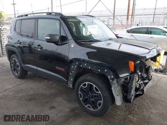 2016 Jeep Renegade Trailhawk z VIN ZACCJBCT0GPD76536, wystawiony jako IAAI lot #42341470 z przebiegiem 158 091 mil mil oraz . Historia ofert i sprzedaży dostępna na DreamBid. Obrazek 1.